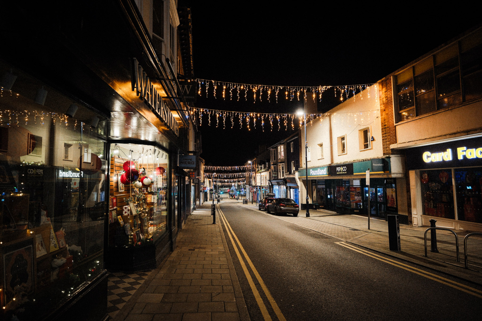 Empty town high street in the evening